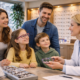 Family visiting a local optical store in Aurora, receiving personalized eye care from an optometrist in a warm, community-focused clinic
